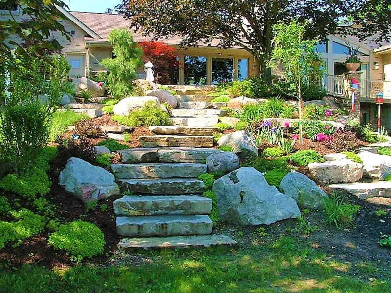 stone staircase leading up to a home